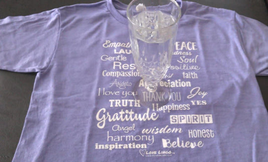 Love Lingo energy-based violet t-shirt with a glass of water