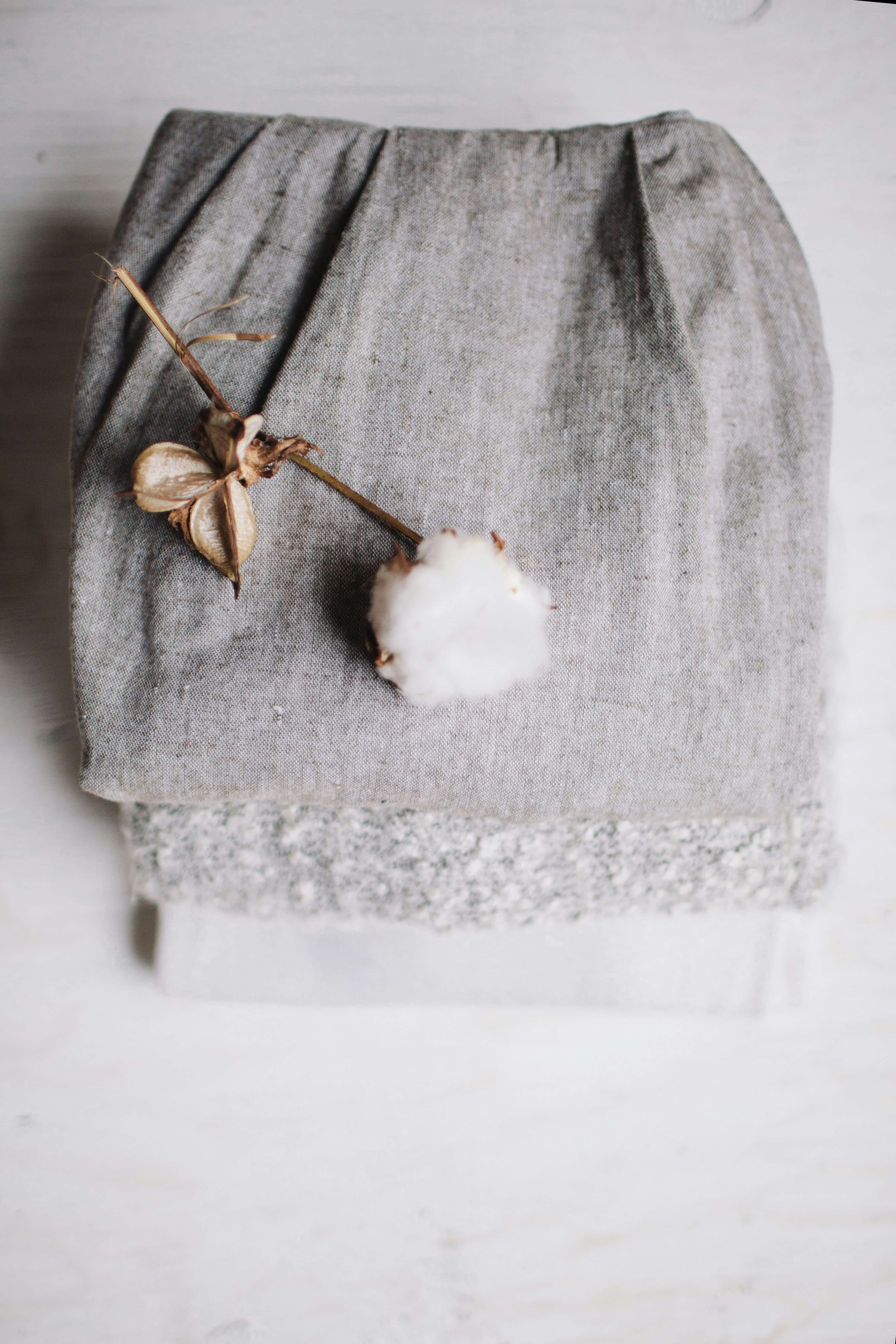 Cotton and wool plant and material visual for the Love Lingo Blog about frequency of material